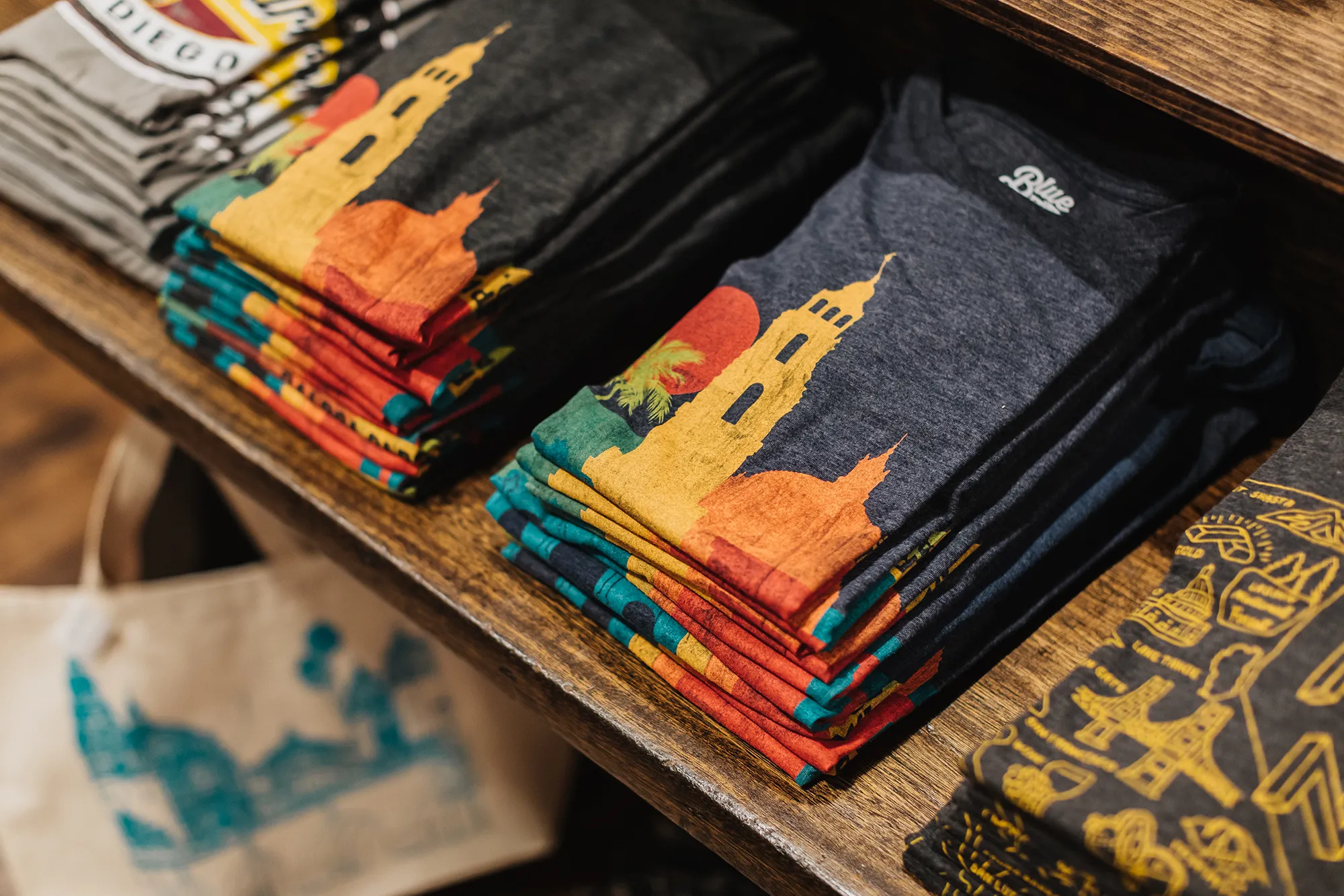 Dark blue t-shirts with yellow outline of California Tower
