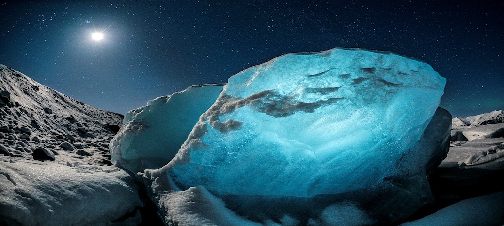 chunk of ice illuminated blue