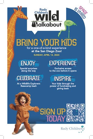 Wild Walkabout poster with brink your kinds written . There is a giraffe on the left side, and a child dressed up in a lion costume at the bottom
