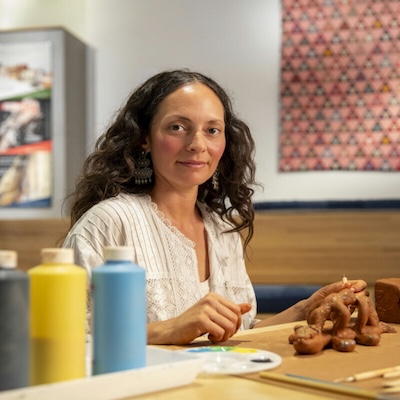 Sarah Garcia sitting at a table