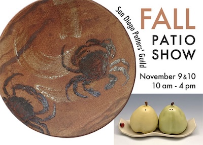 Fall patio show with a plate with crabs on it and a set of pears