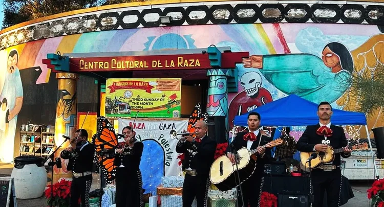Centro Cultural de la Raza with a band playing in front
